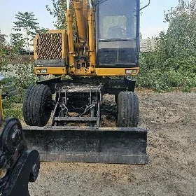Caterpillar 310 Series 2010
