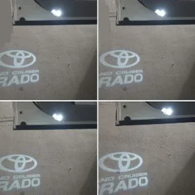"PRADO" ýazgyly gapy çyra