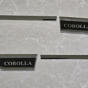 "COROLLA" ýazgyly krylo emblema