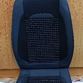 Masaj edýän oturgyç örtügi