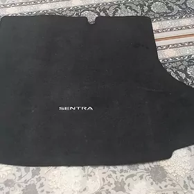 Nissan Sentra bagaź kowrik