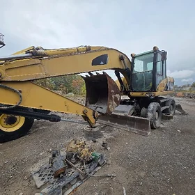 Caterpillar 320 Series 2012