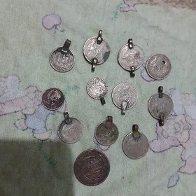 монеты teññe