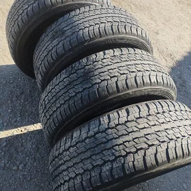 285 60 18 DUNLOP